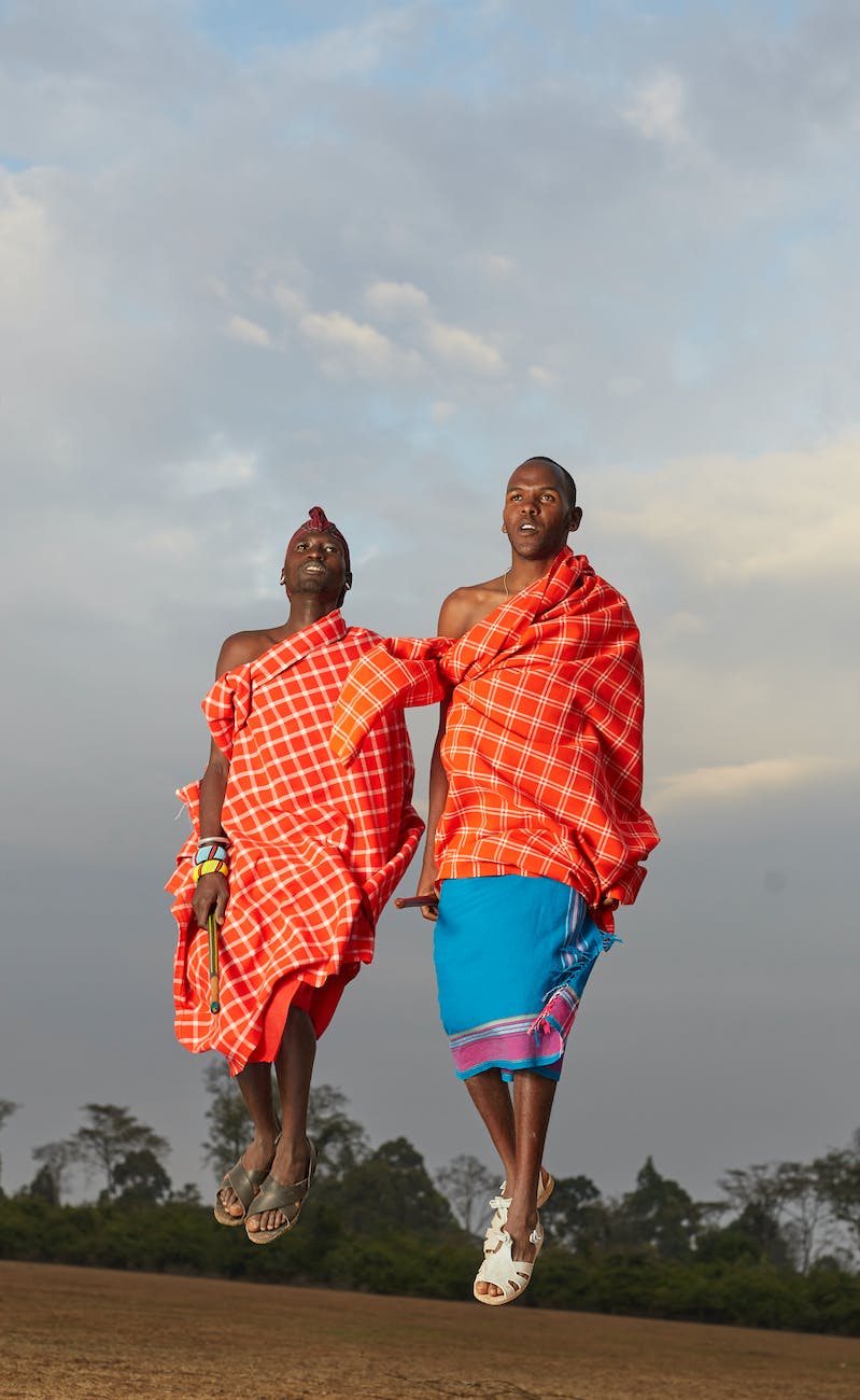 Samburu men in traditional dresses jumping in Central Rift Vallye region in Kenya