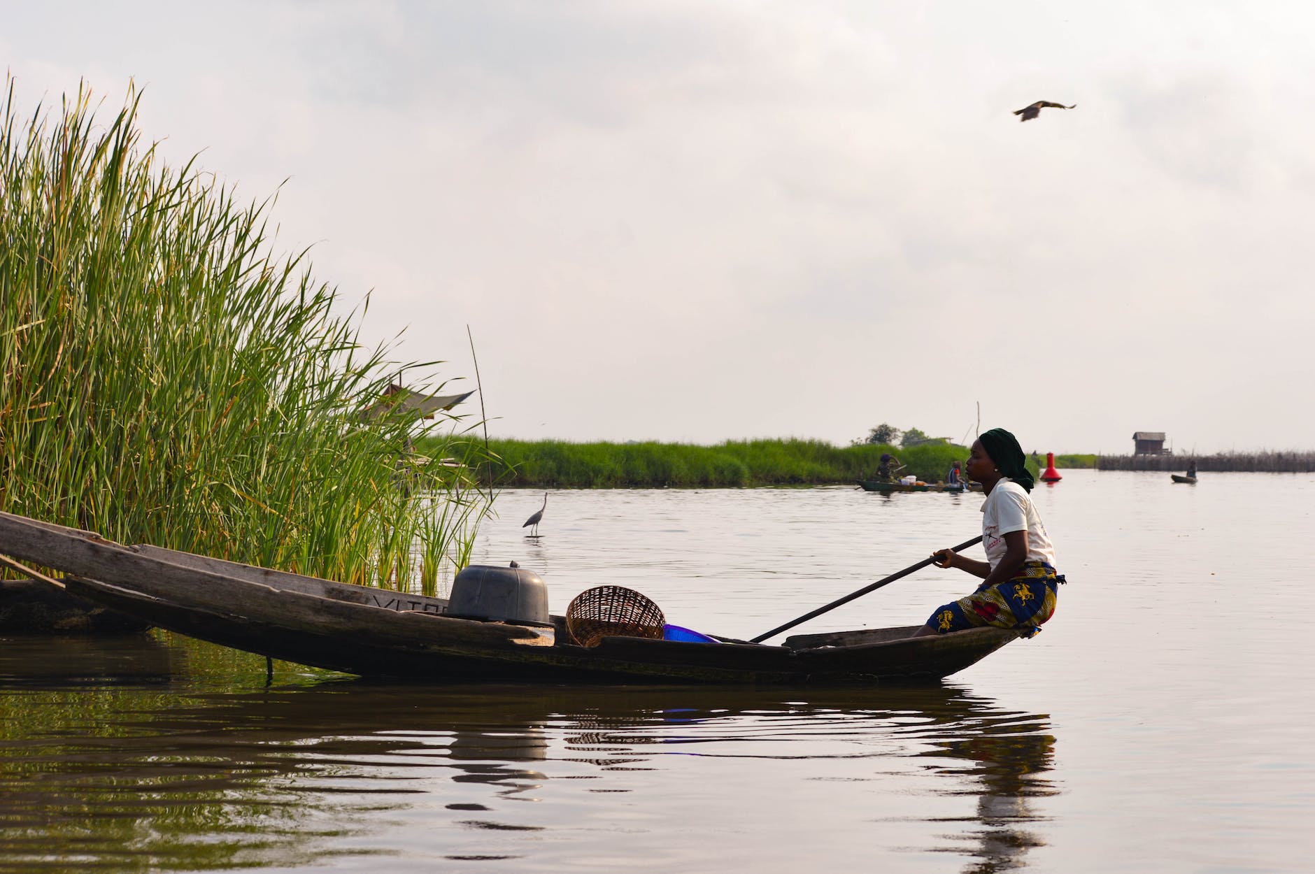 a woman riding a boat